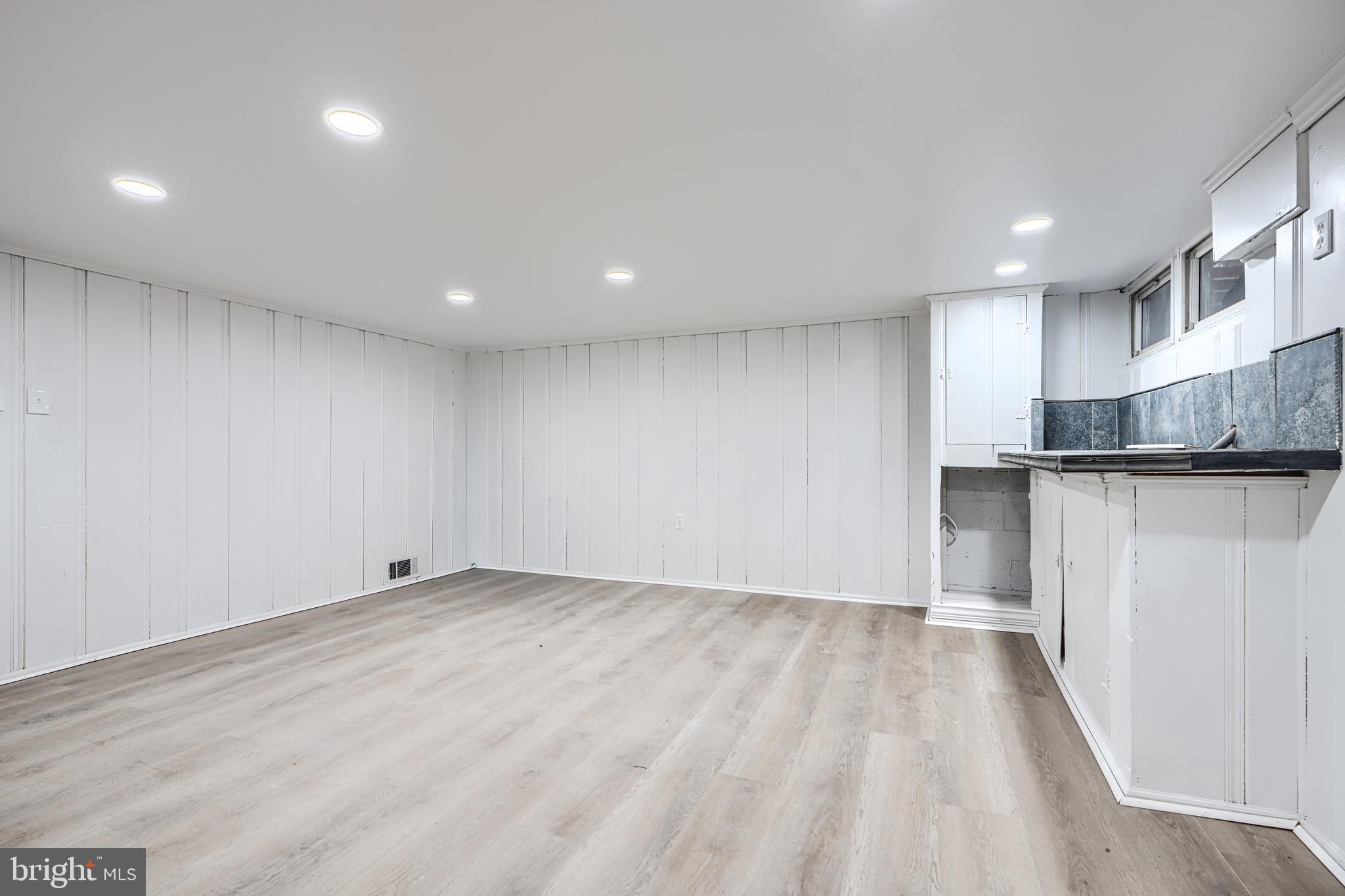 8235 Pleasant Plains Road Towson, MD 21286 - Photo 28 of 42 a view of a kitchen with a sink and a window