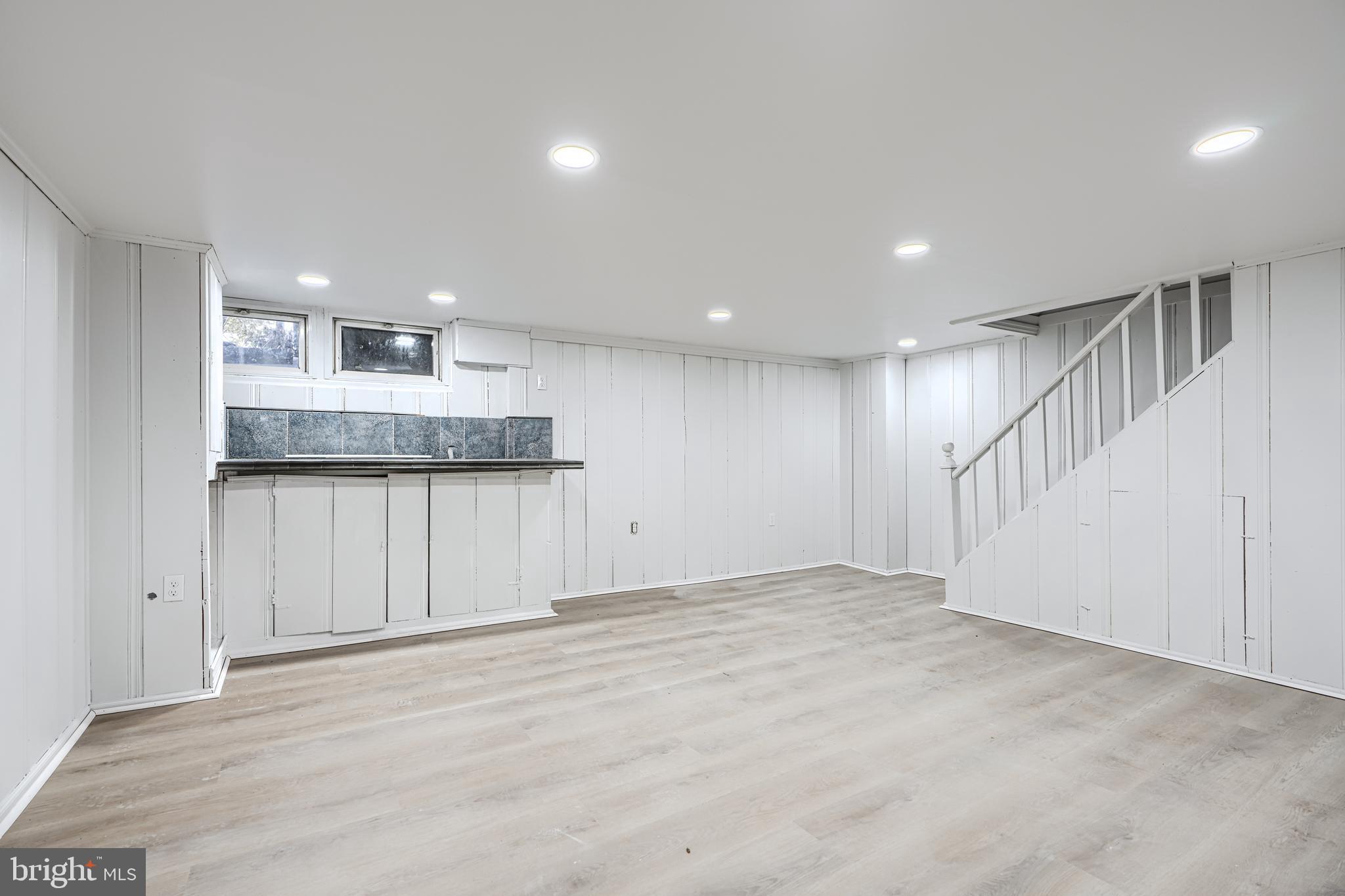 8235 Pleasant Plains Road Towson, MD 21286 - Photo 30 of 42 a view of kitchen with cabinet and stairs