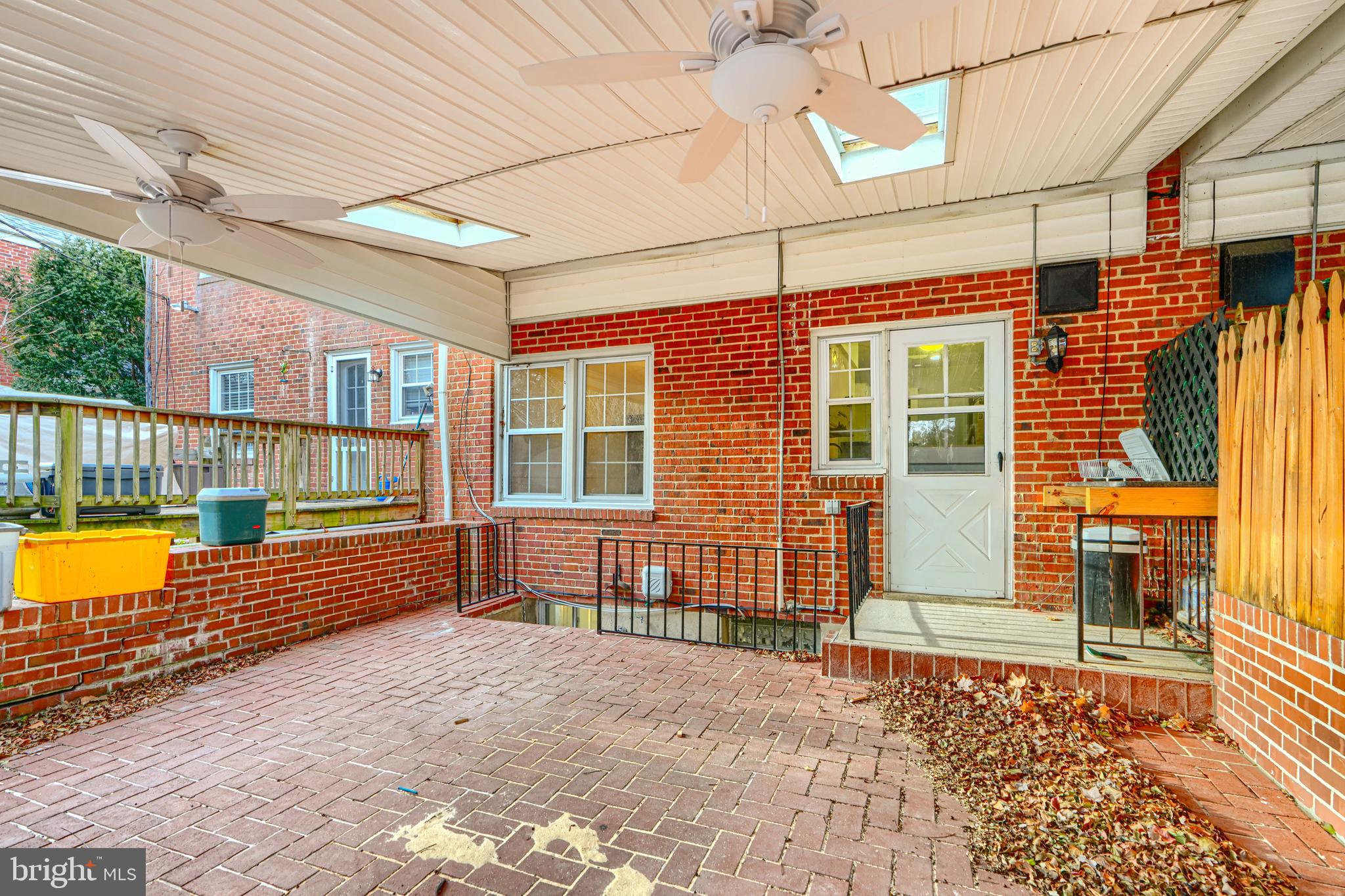 8235 Pleasant Plains Road Towson, MD 21286 - Photo 36 of 42 a view of a house with a wooden deck