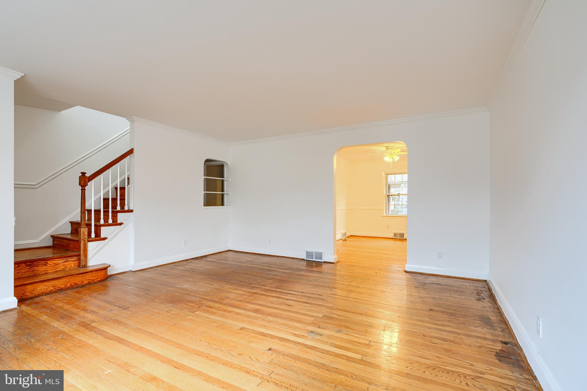 8235 Pleasant Plains Road Towson, MD 21286 - Photo 4 of 42 a view of empty room with wooden floor