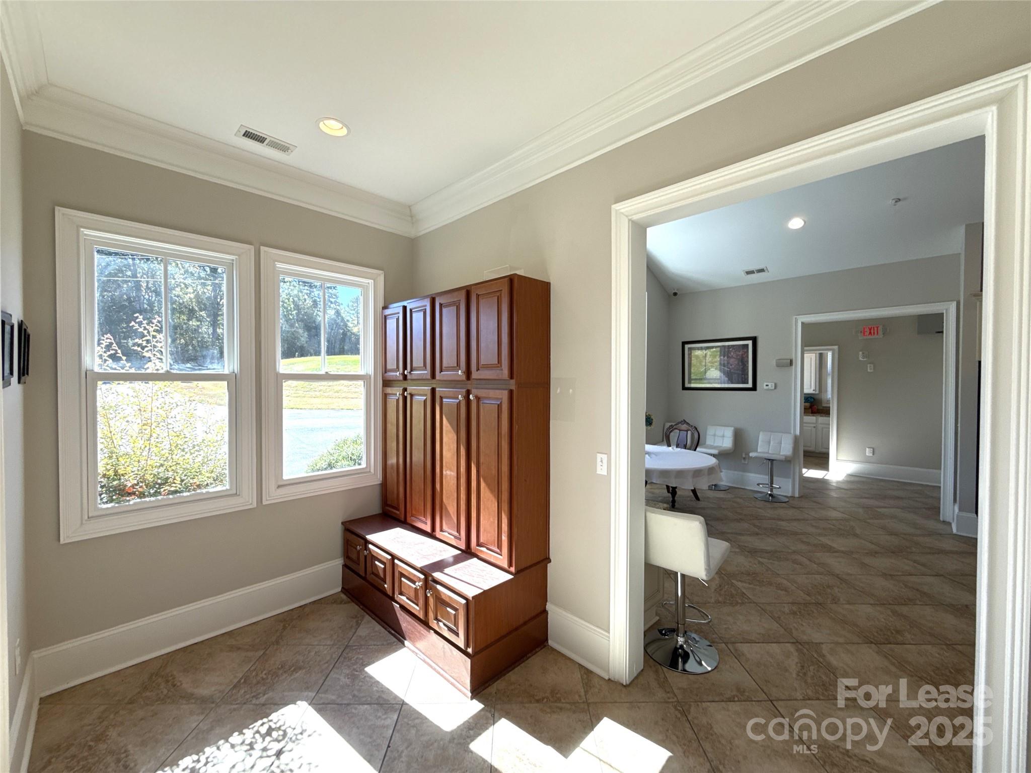 14019 Thompson Road Charlotte, NC 28227 - Photo 17 of 43 a living room with furniture and large windows
