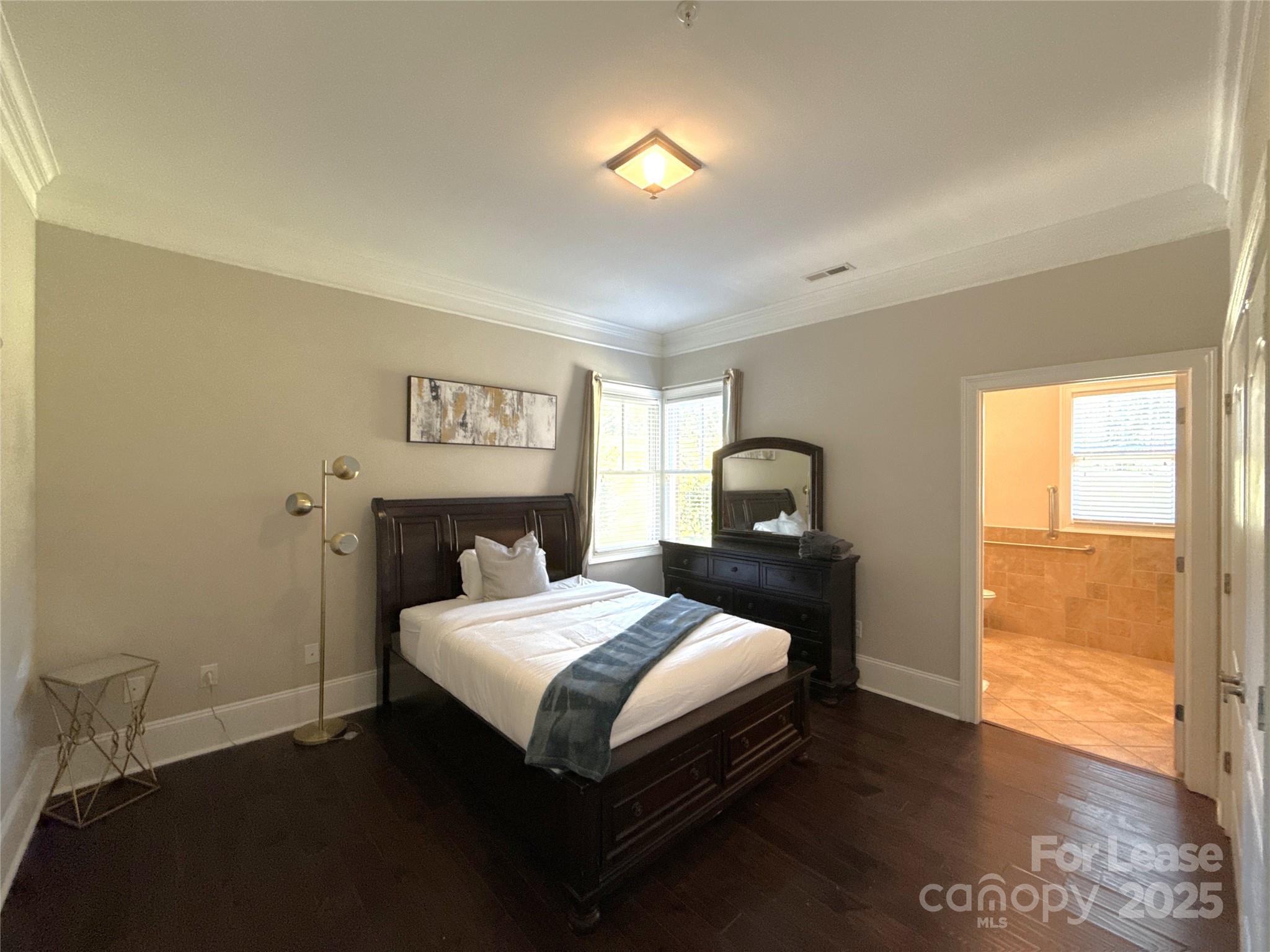 14019 Thompson Road Charlotte, NC 28227 - Photo 20 of 43 a bedroom with a bed and a window