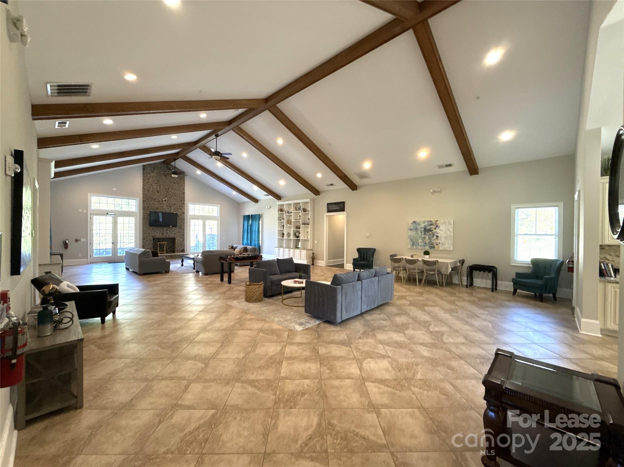 14019 Thompson Road Charlotte, NC 28227 - Photo 7 of 43 a living room with fireplace furniture and a large window