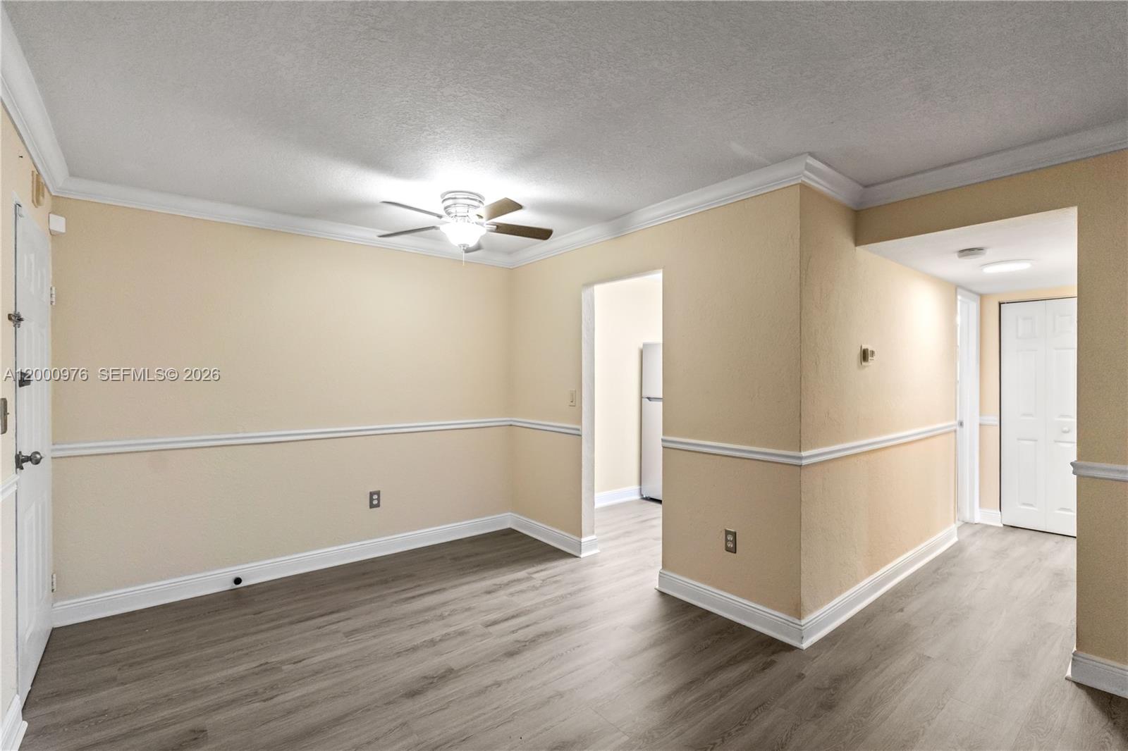9441 Southwest 76th Street, Unit V32 Miami, FL 33173 - Photo 12 of 28 a view of a livingroom with wooden floor