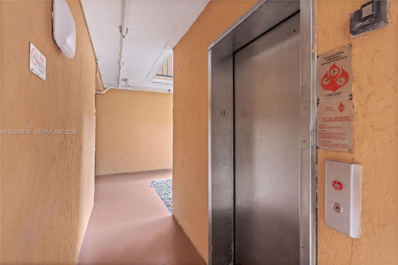 9441 Southwest 76th Street, Unit V32 Miami, FL 33173 - Photo 19 of 28 a view of hallway with stairs