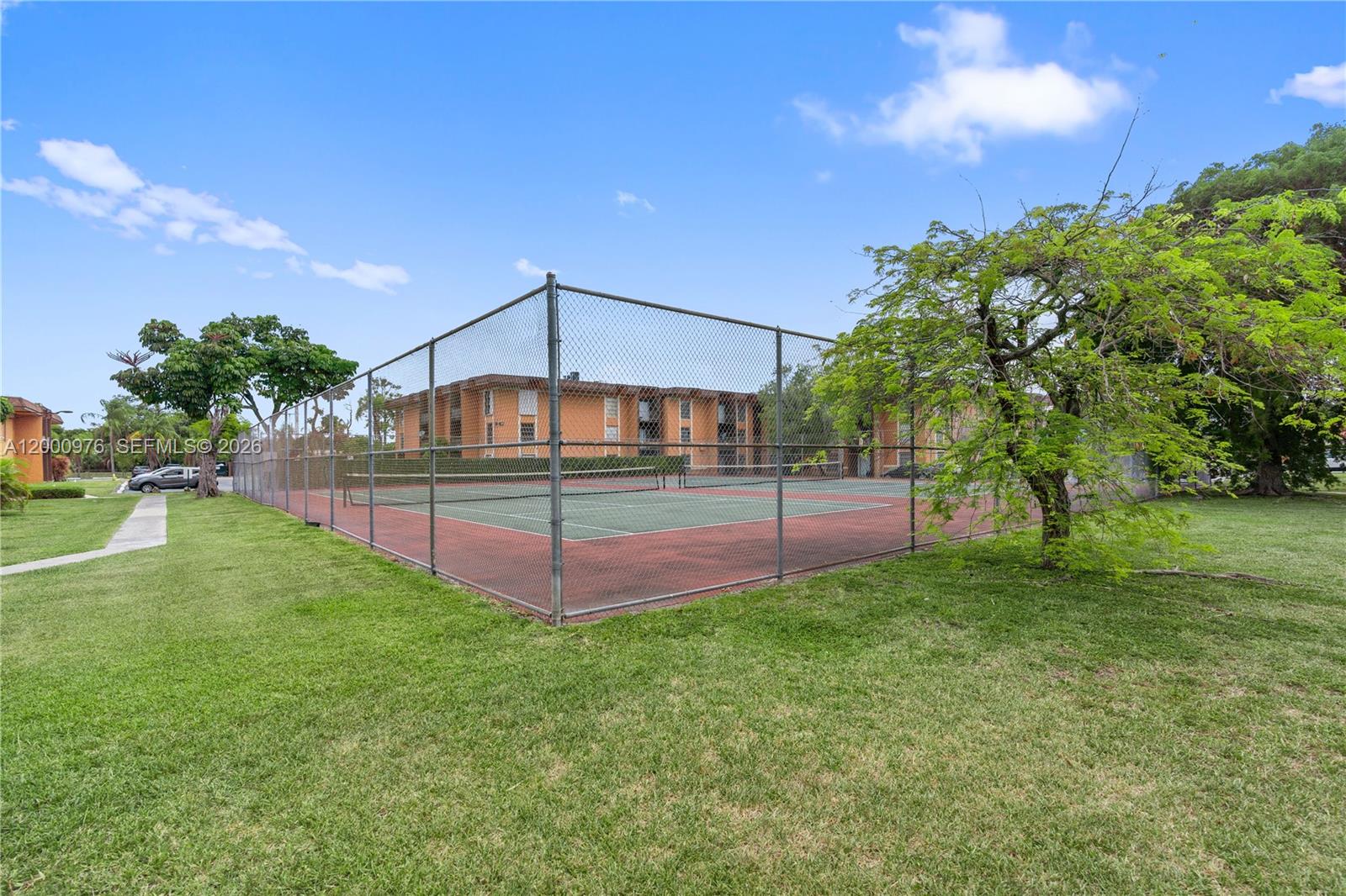 9441 Southwest 76th Street, Unit V32 Miami, FL 33173 - Photo 23 of 28 a view of a backyard