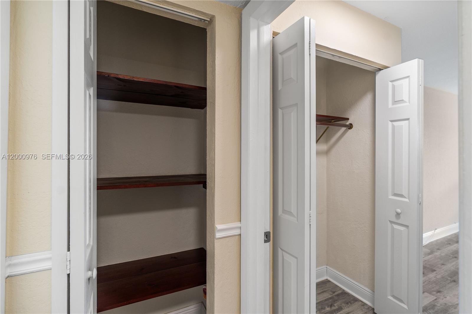 9441 Southwest 76th Street, Unit V32 Miami, FL 33173 - Photo 4 of 28 a bathroom with a walk in closet