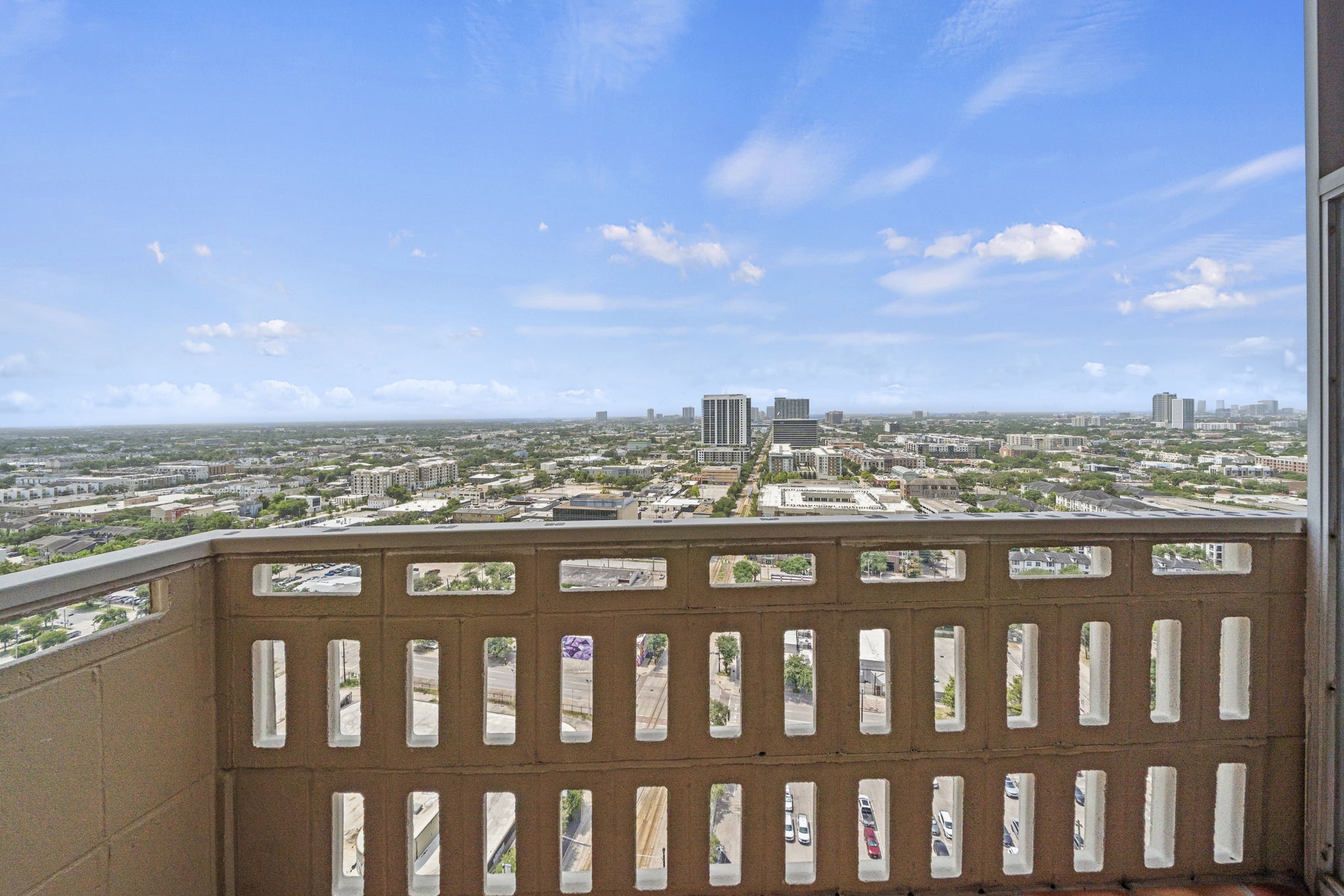 2016 Main Street, Unit 2302 Houston, TX 77002 - Photo 22 of 34 Beautiful city views from the private balcony, offering an elevated perspective from the 23rd floor.