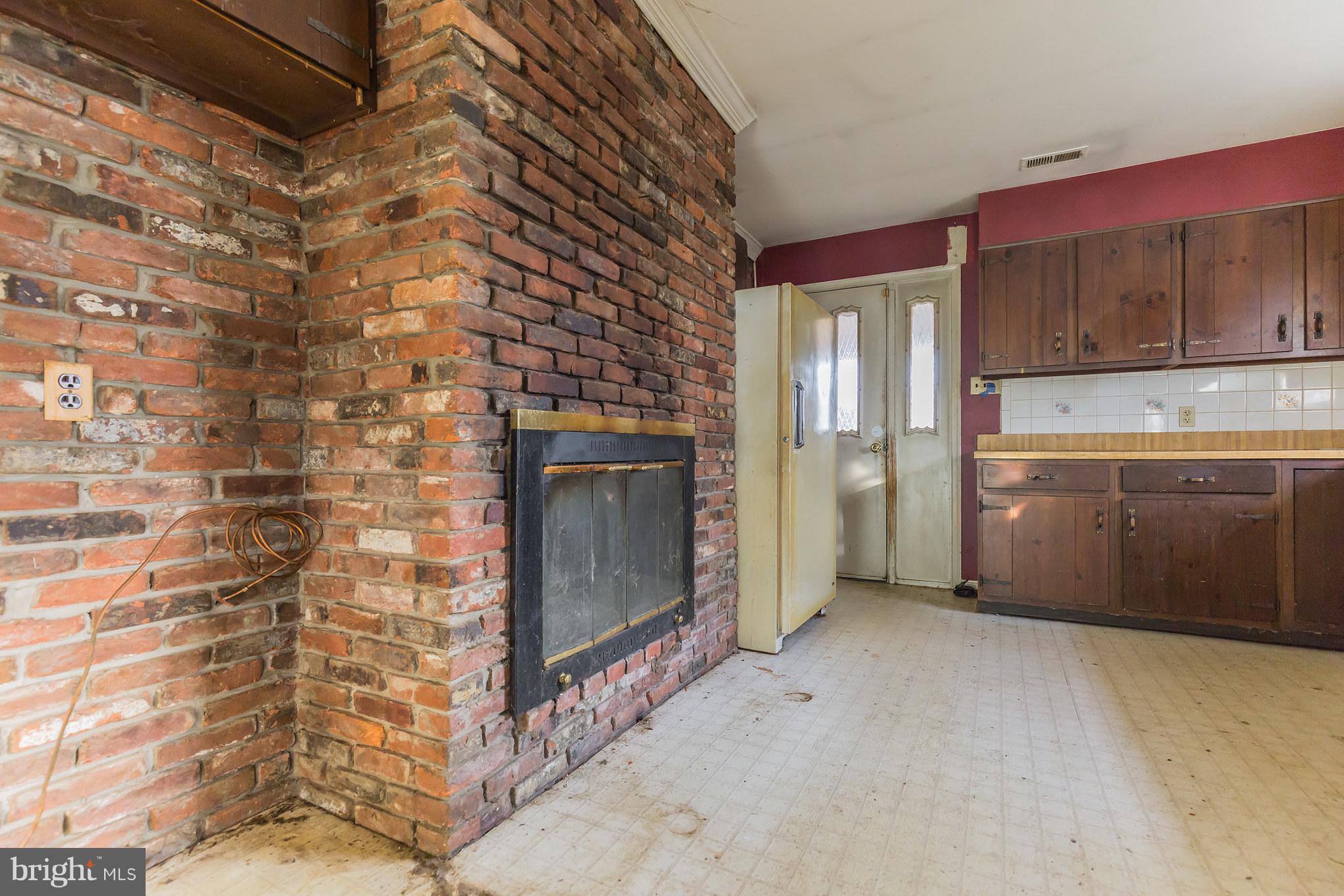 369 Friendship Road Friendship, MD 20758 - Photo 13 of 18 a view of a kitchen with a sink cabinets and a window