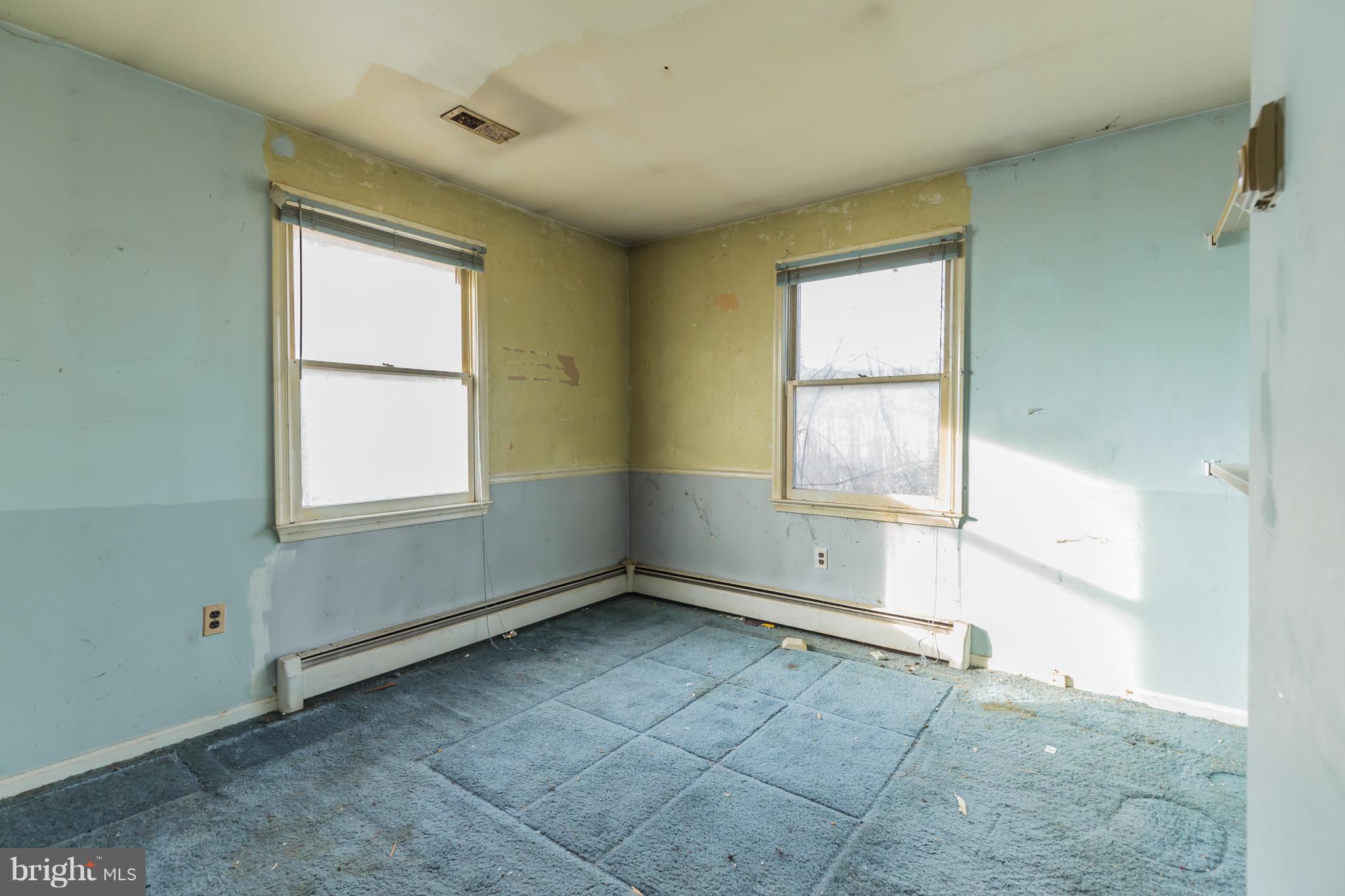 369 Friendship Road Friendship, MD 20758 - Photo 16 of 18 an empty room with windows