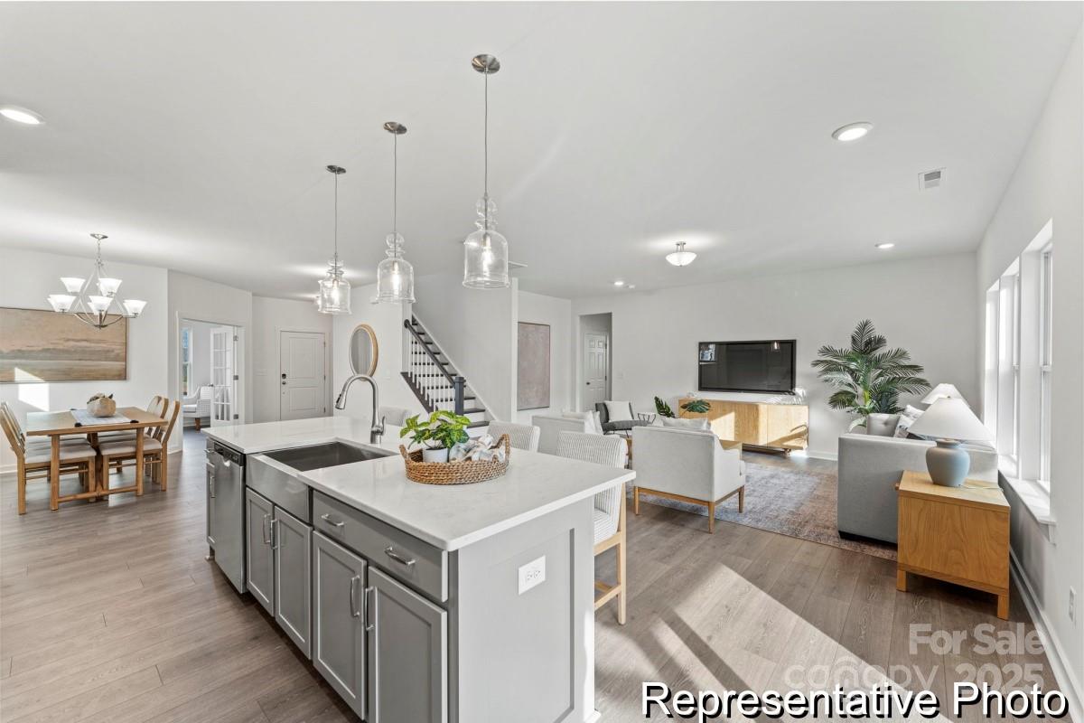 111 West Rice Planters Way, Unit 2P Statesville, NC 28625 - Photo 4 of 19 a view of living room and dining room