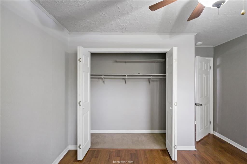 3906 Aspen Street, Unit C Bryan, TX 77801 - Photo 14 of 16 a view of an empty walk in closet