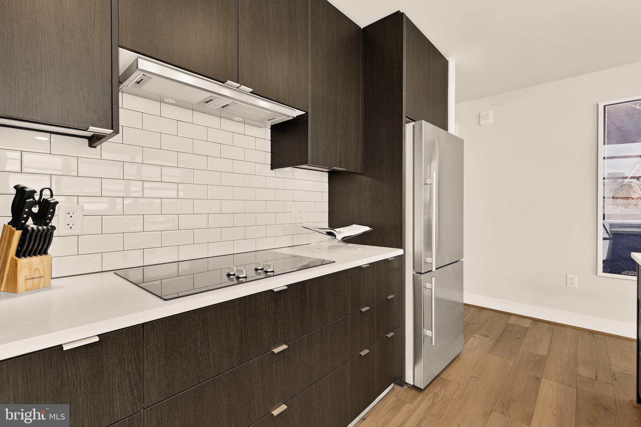 1300 4th Street Southeast, Unit 812 Washington, DC 20003 - Photo 11 of 40 a bathroom with a sink and a mirror
