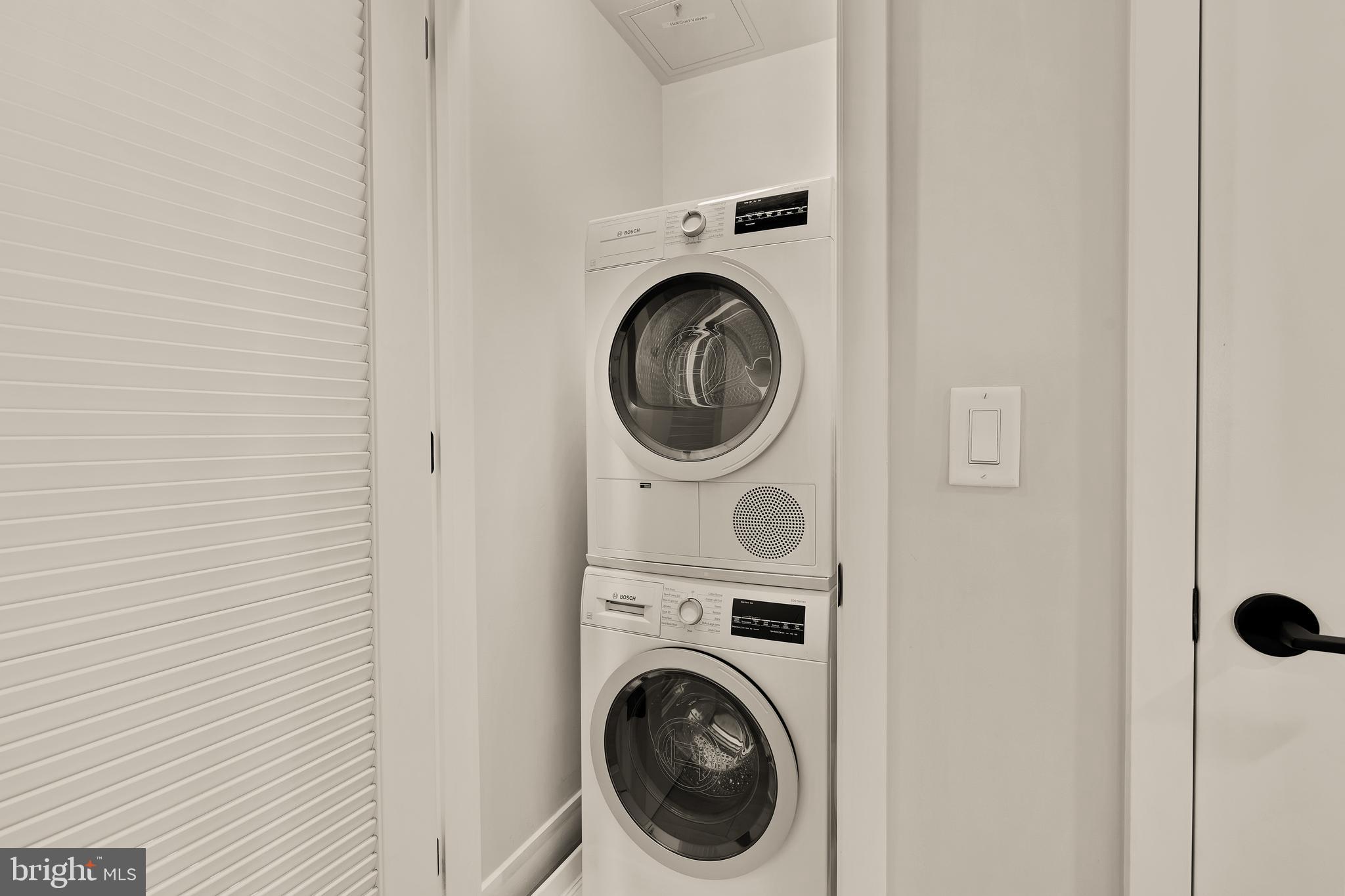 1300 4th Street Southeast, Unit 812 Washington, DC 20003 - Photo 24 of 40 a utility room with dryer and washer