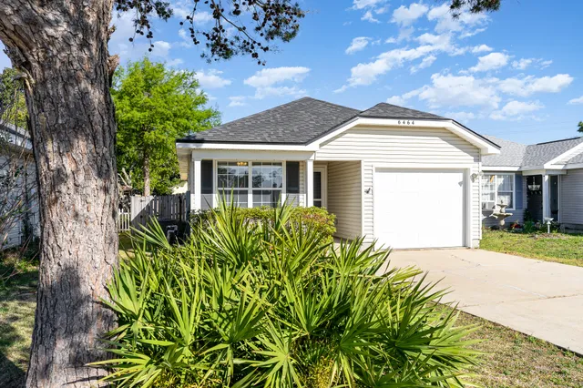 front view of a house with a big yard