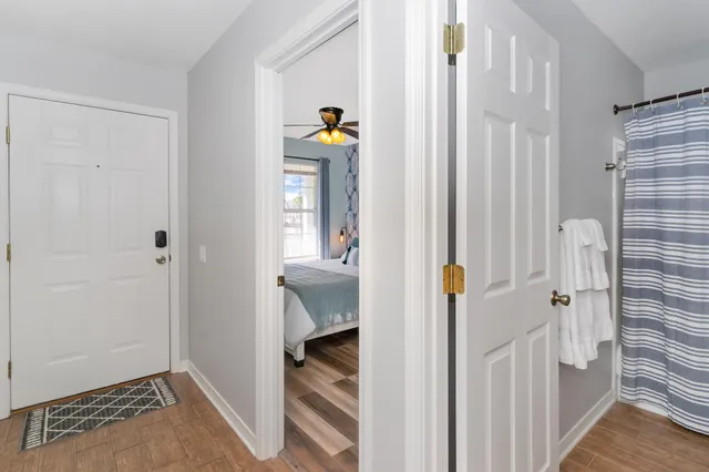 a view of a bedroom from a hallway