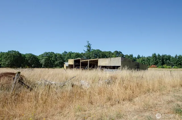a view of a lake with a yard