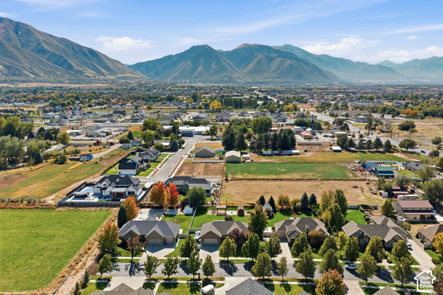 1447 Meadow Lane Mapleton, UT 84664 - Photo 60 of 67 Expansive mountain backdrop with a residential area and agricultural land
