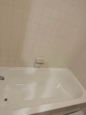 a bathroom with a bathtub