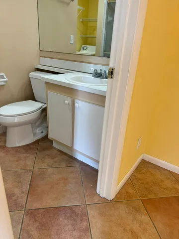 a bathroom with a sink and a toilet