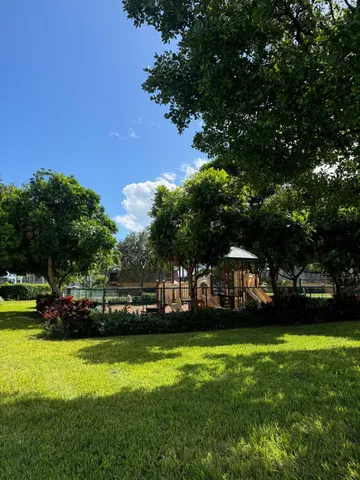 a view of a house with a big yard