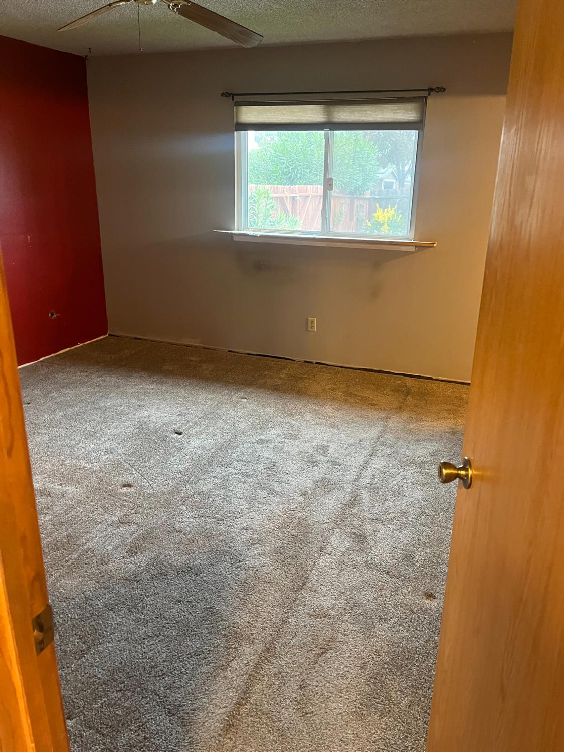2401 Claridge Lane Stockton, CA 95210 - Photo 12 of 25 a view of an empty room with a window