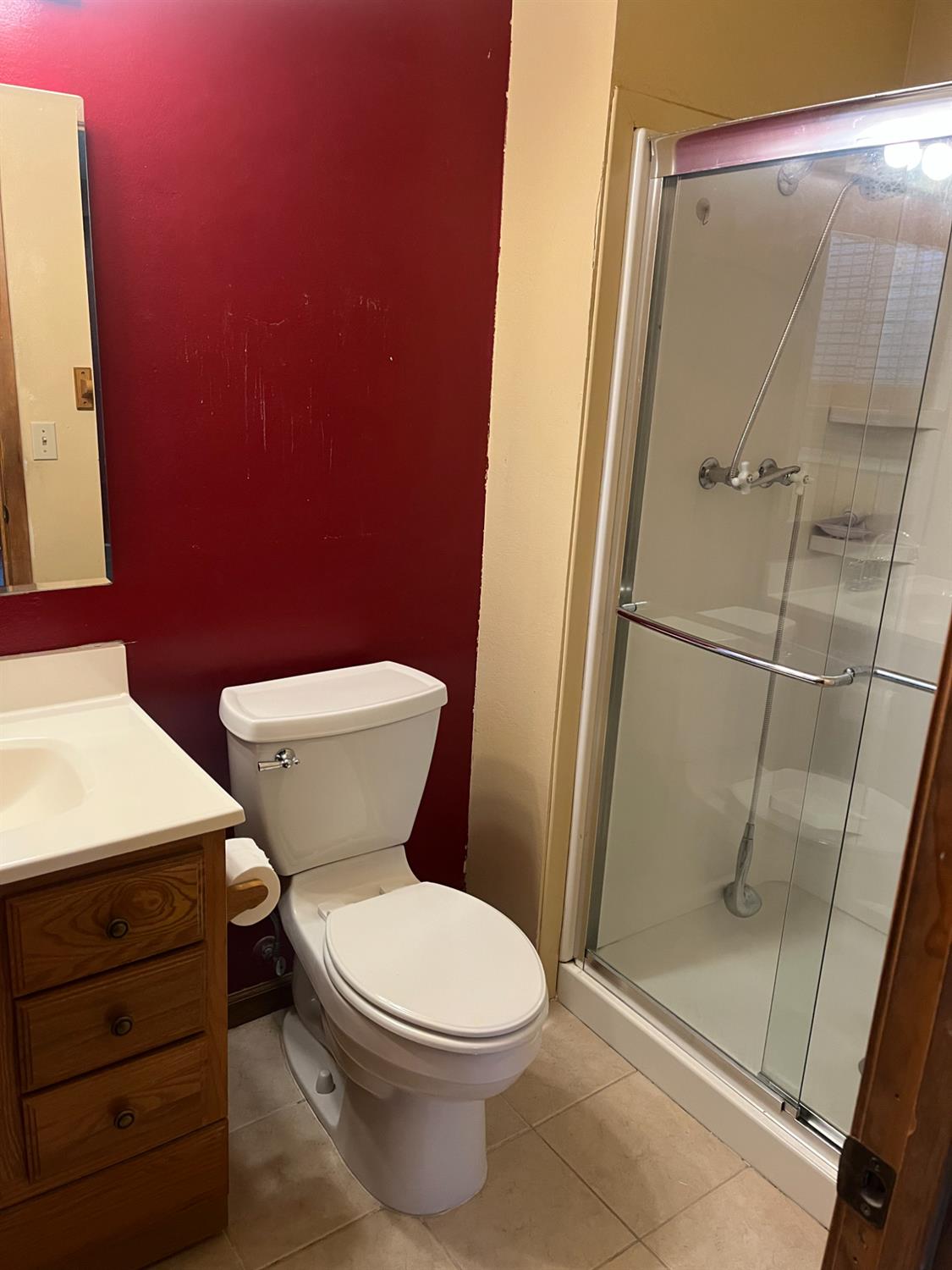 2401 Claridge Lane Stockton, CA 95210 - Photo 18 of 25 a bathroom with a toilet and a shower