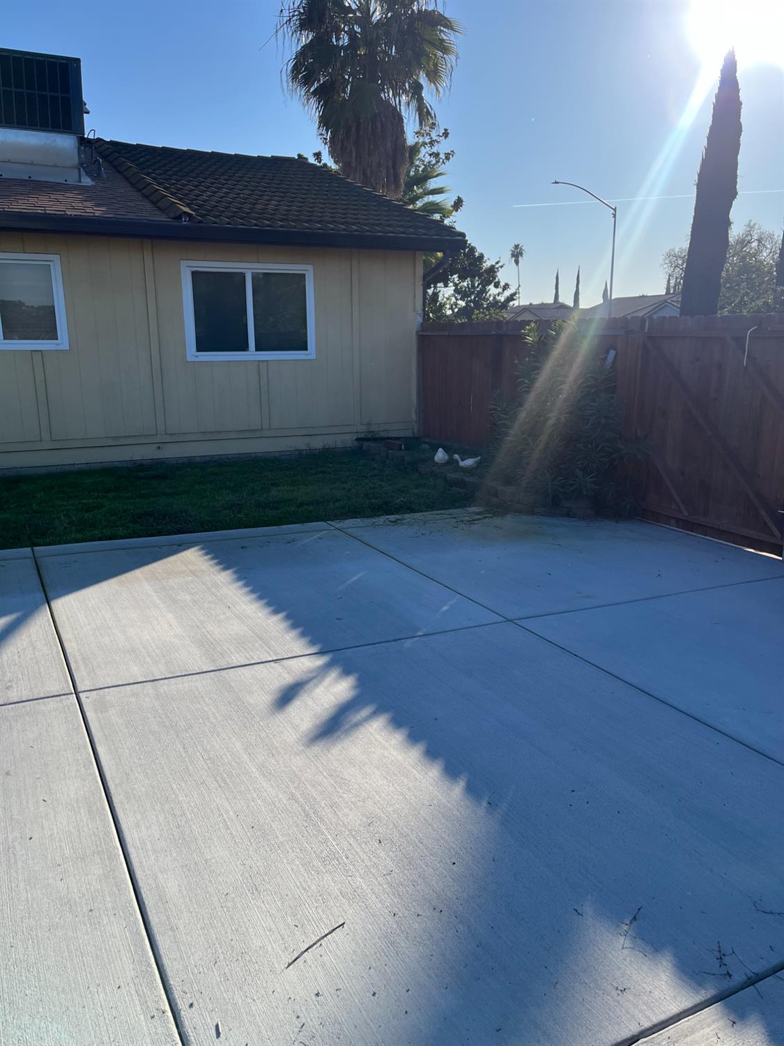 2401 Claridge Lane Stockton, CA 95210 - Photo 23 of 25 a view of backyard of a house