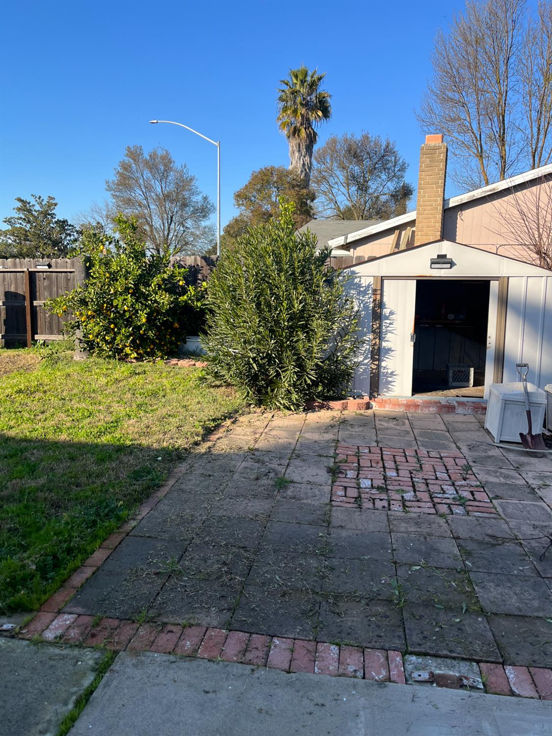 2401 Claridge Lane Stockton, CA 95210 - Photo 24 of 25 a view of a yard with an outdoor space