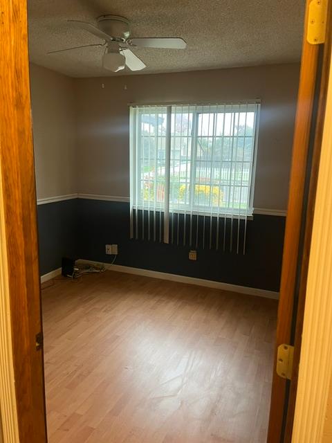 2401 Claridge Lane Stockton, CA 95210 - Photo 8 of 25 a view of an empty room with a window
