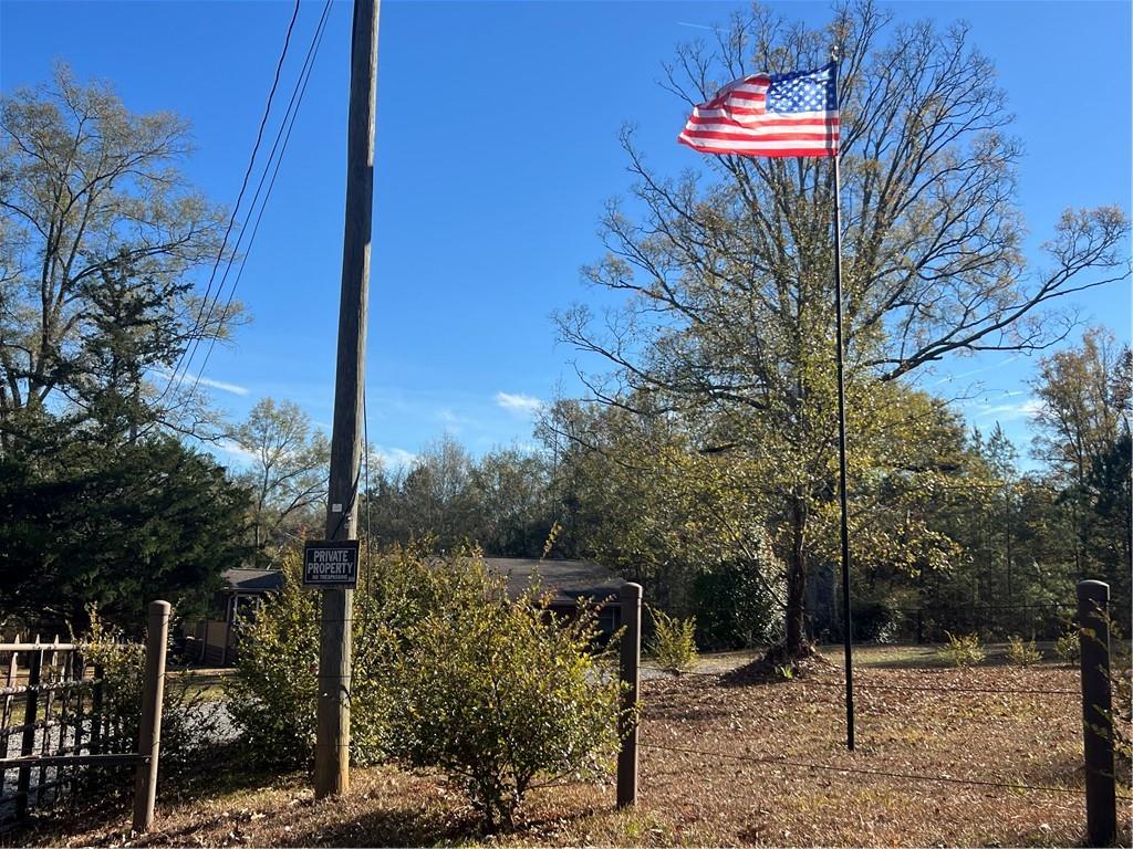 131 Twin Bridges Road Southwest Eatonton, GA 31024 - Photo 4 of 53 a view of a street with large trees