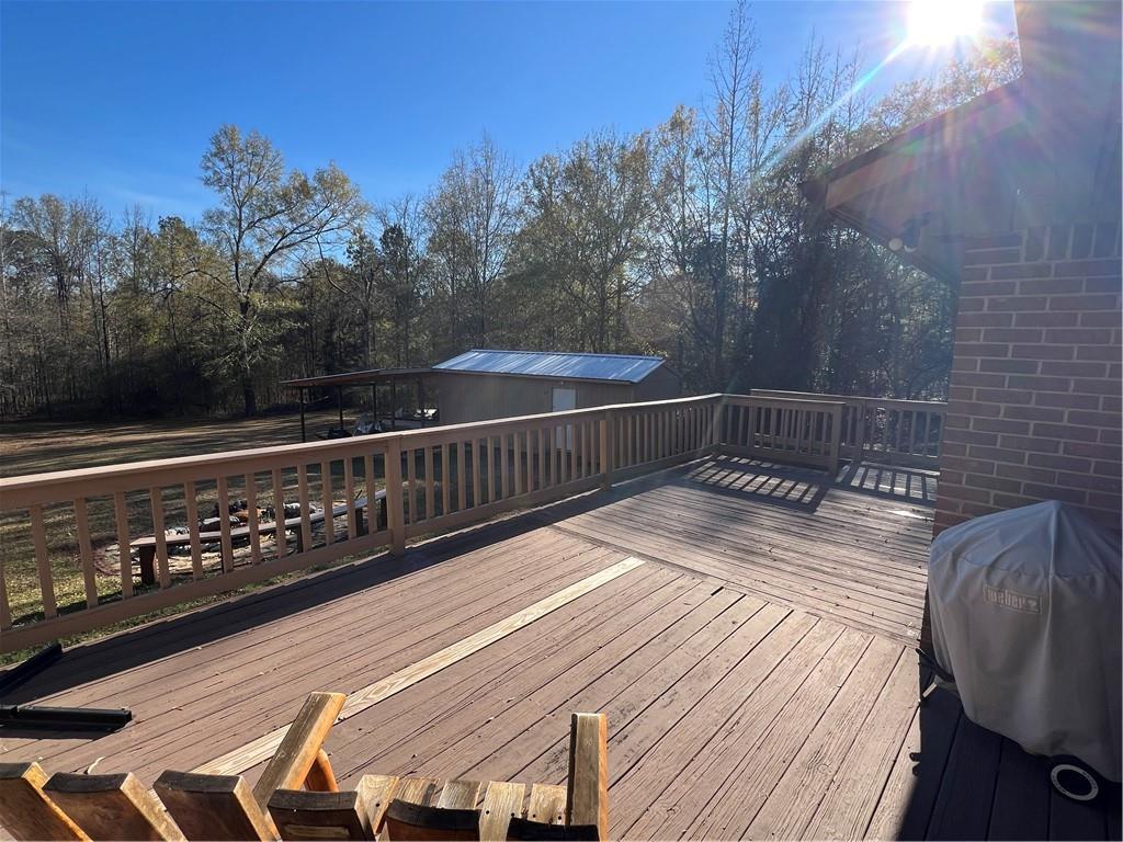 131 Twin Bridges Road Southwest Eatonton, GA 31024 - Photo 42 of 53 a view of balcony with wooden floor