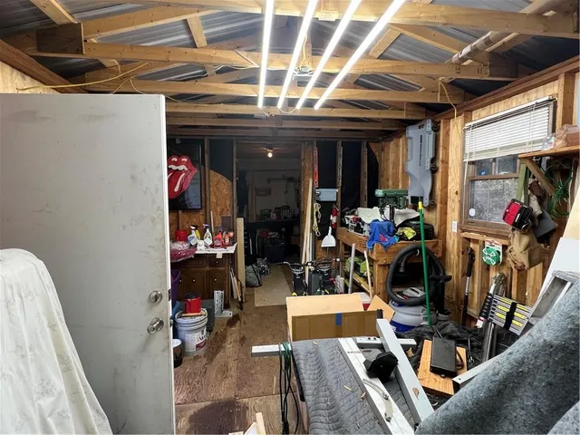 a view of a backyard with hardwood