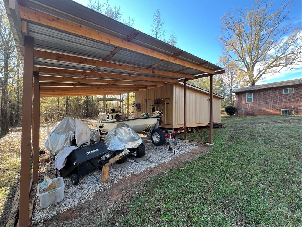 131 Twin Bridges Road Southwest Eatonton, GA 31024 - Photo 49 of 53 a view of a backyard with hardwood