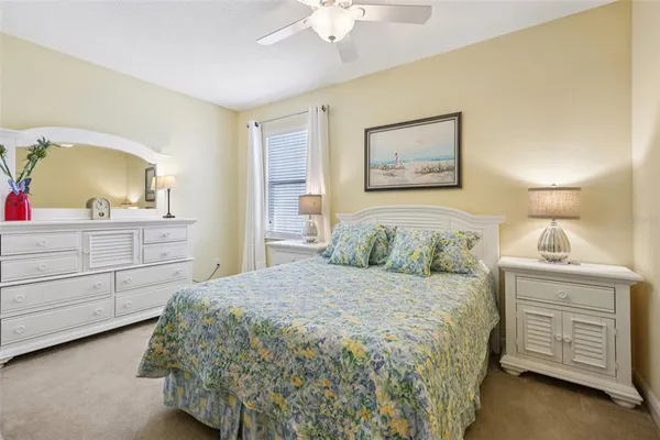 a living room with furniture city view and large windows