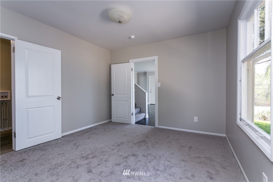 4704 Guide Meridian Bellingham, WA 98226 - Photo 22 of 29 an empty room with windows and closet
