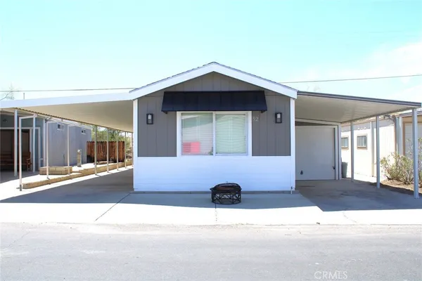 a front view of a house with garage