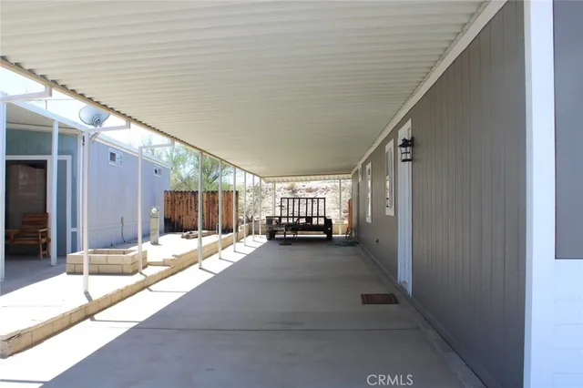 a view of a house with porch and patio