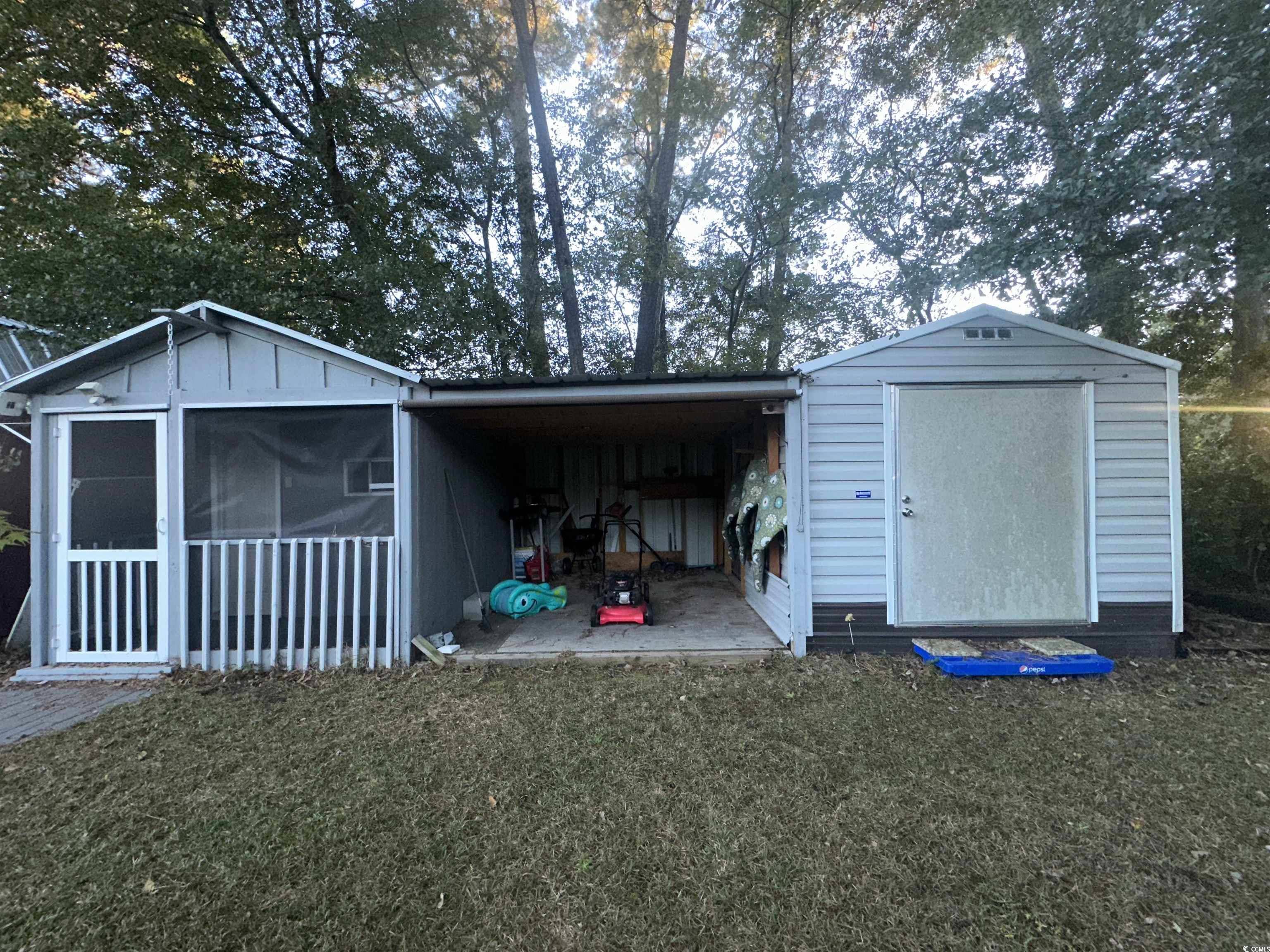118 Wofford Road Conway, SC 29526 - Photo 8 of 26 View of outdoor structure featuring a yard