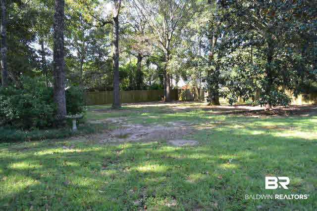 10373 Hunters Ridge Drive Mobile, AL 36695 - Photo 20 of 25 Large fenced backyard with mature landscaping and trees