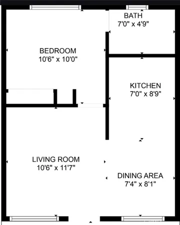 a kitchen with granite countertop a refrigerator a stove and white cabinets