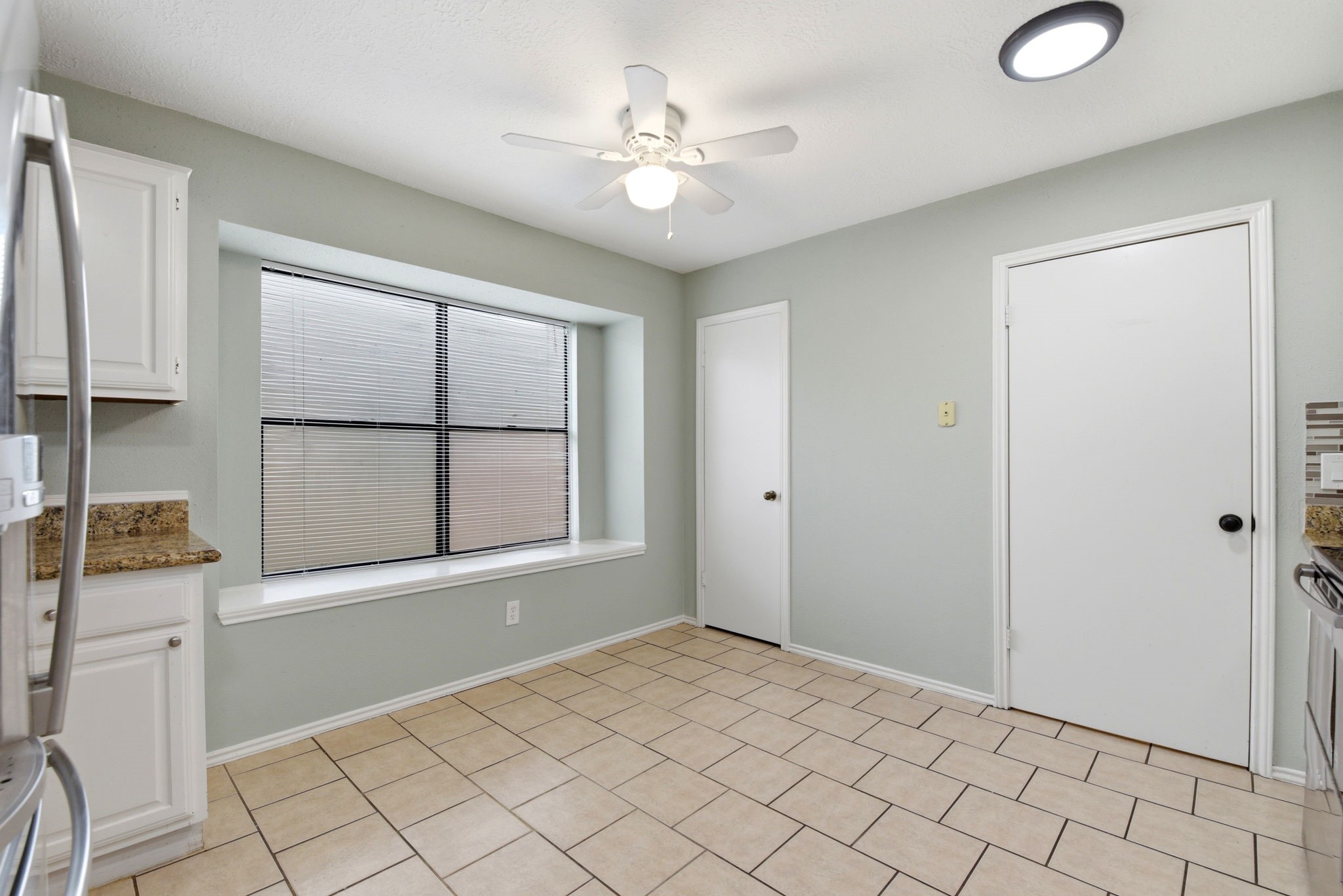 21330 Golden Dove Drive Spring, TX 77388 - Photo 12 of 29 Start your day right! The sunny breakfast nook features a charming bay window ledge—the perfect spot for your morning coffee and indoor plants.