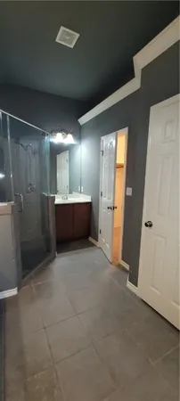 an empty room with a bathroom