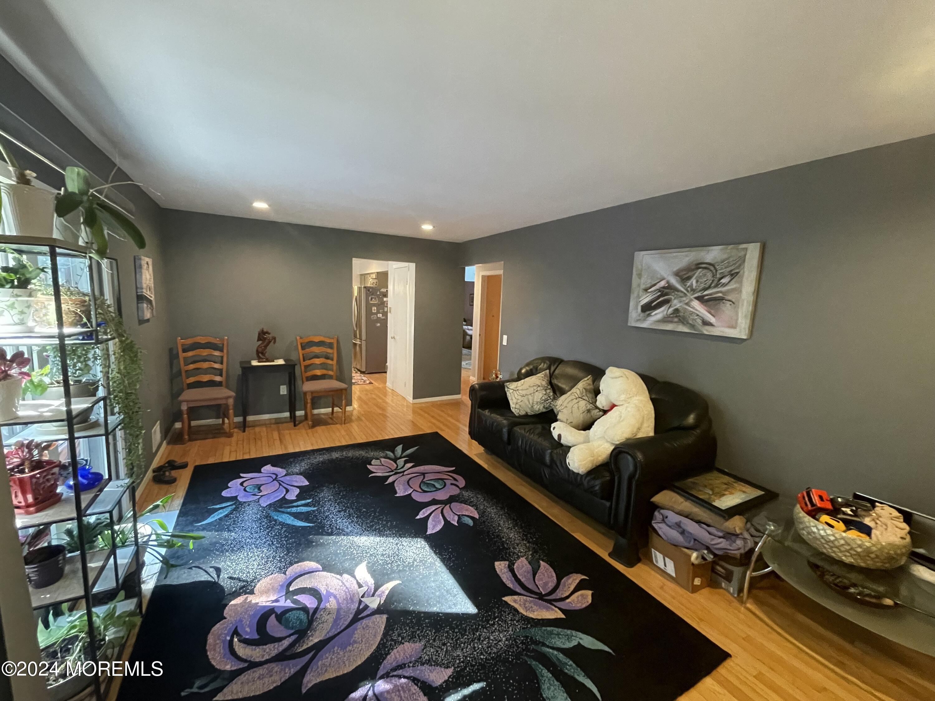 4 Rimwood Lane Howell, NJ 07731 - Photo 18 of 44 a room with furniture and gym equipment