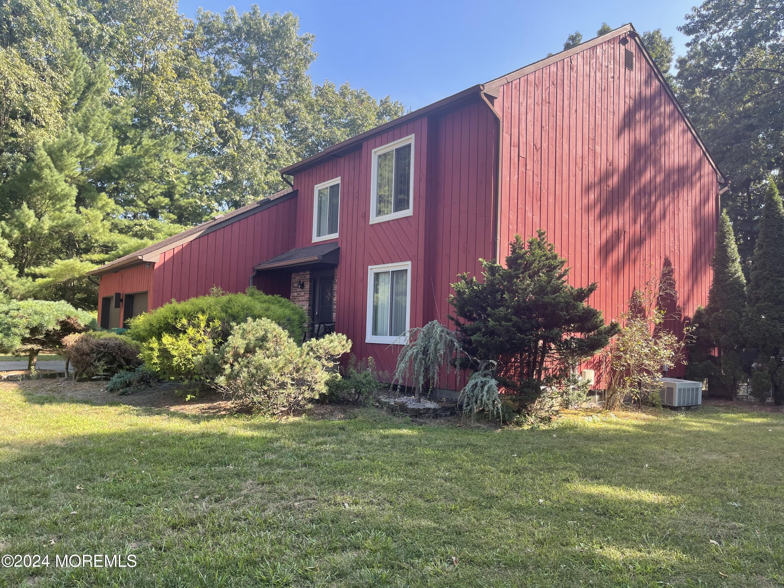 4 Rimwood Lane Howell, NJ 07731 - Photo 2 of 44 a view of a house with a yard