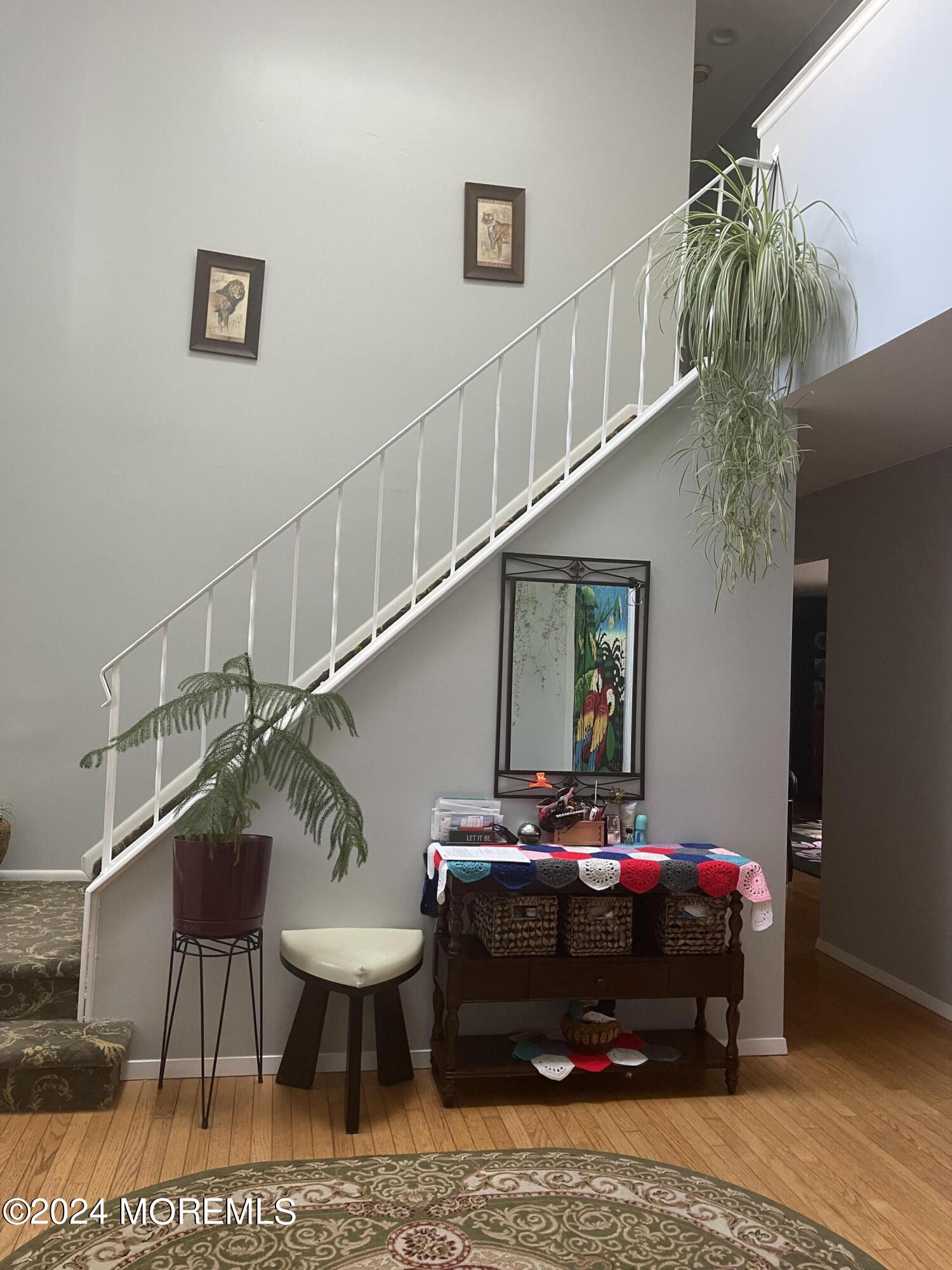 4 Rimwood Lane Howell, NJ 07731 - Photo 24 of 44 a living room with furniture and a potted plant
