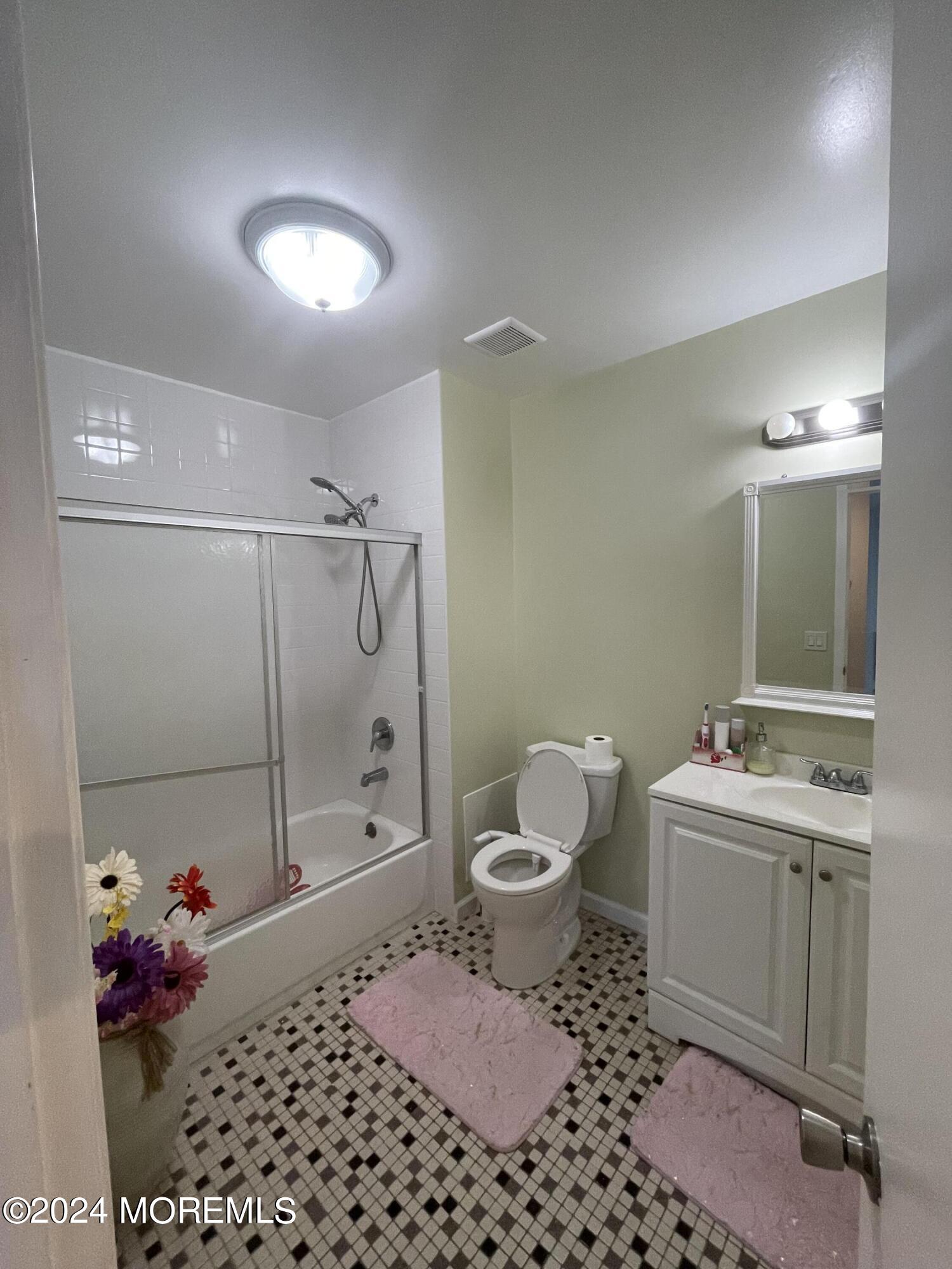 4 Rimwood Lane Howell, NJ 07731 - Photo 25 of 44 a bathroom with a sink a toilet and shower