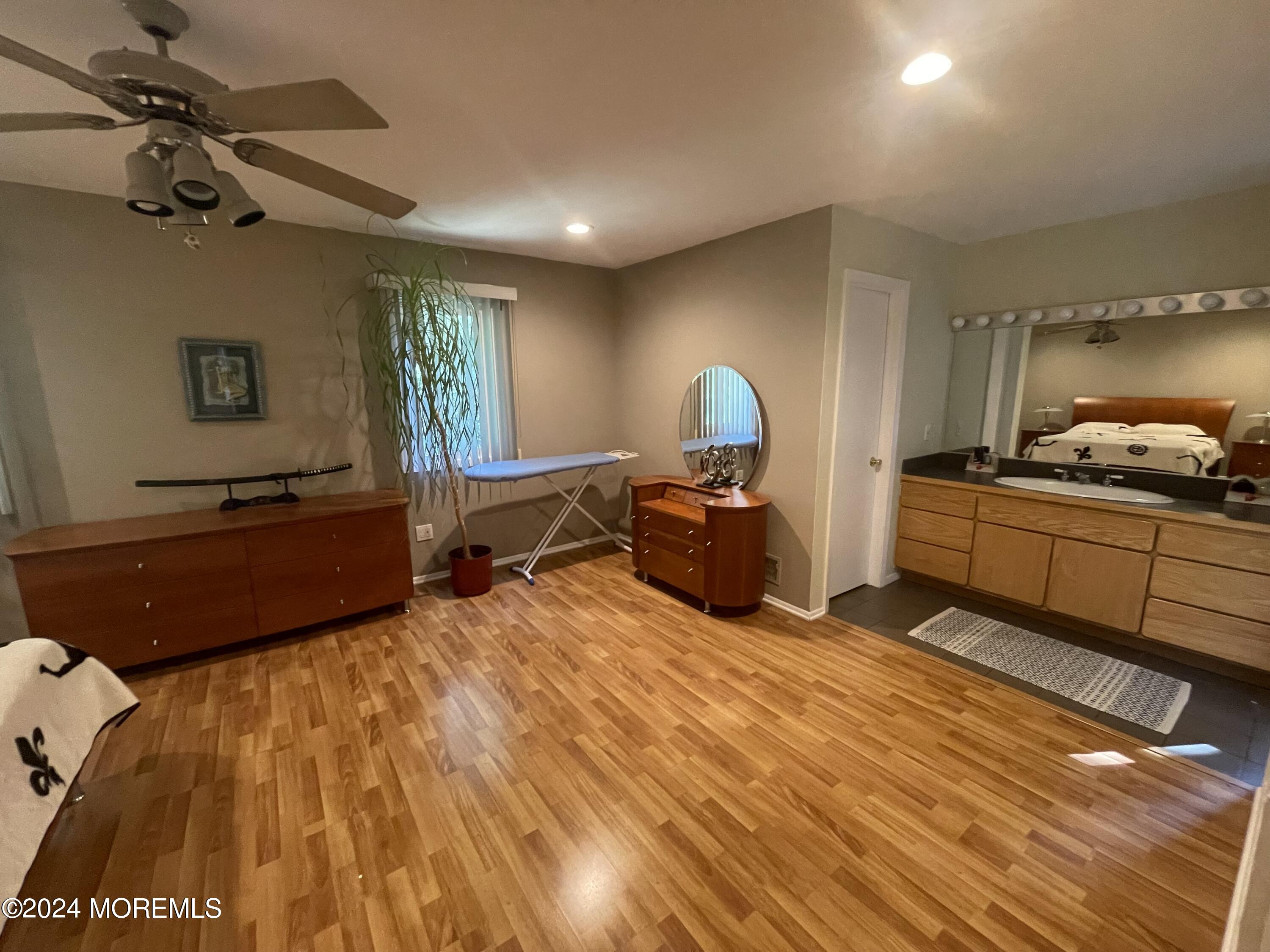 4 Rimwood Lane Howell, NJ 07731 - Photo 26 of 44 a bed room with a bed and a night stand