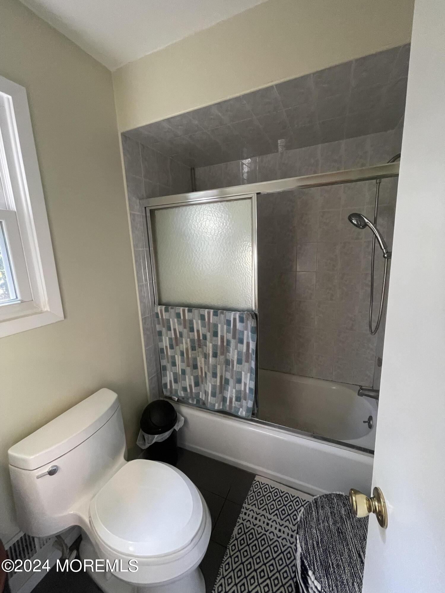 4 Rimwood Lane Howell, NJ 07731 - Photo 29 of 44 a bathroom with a toilet and shower