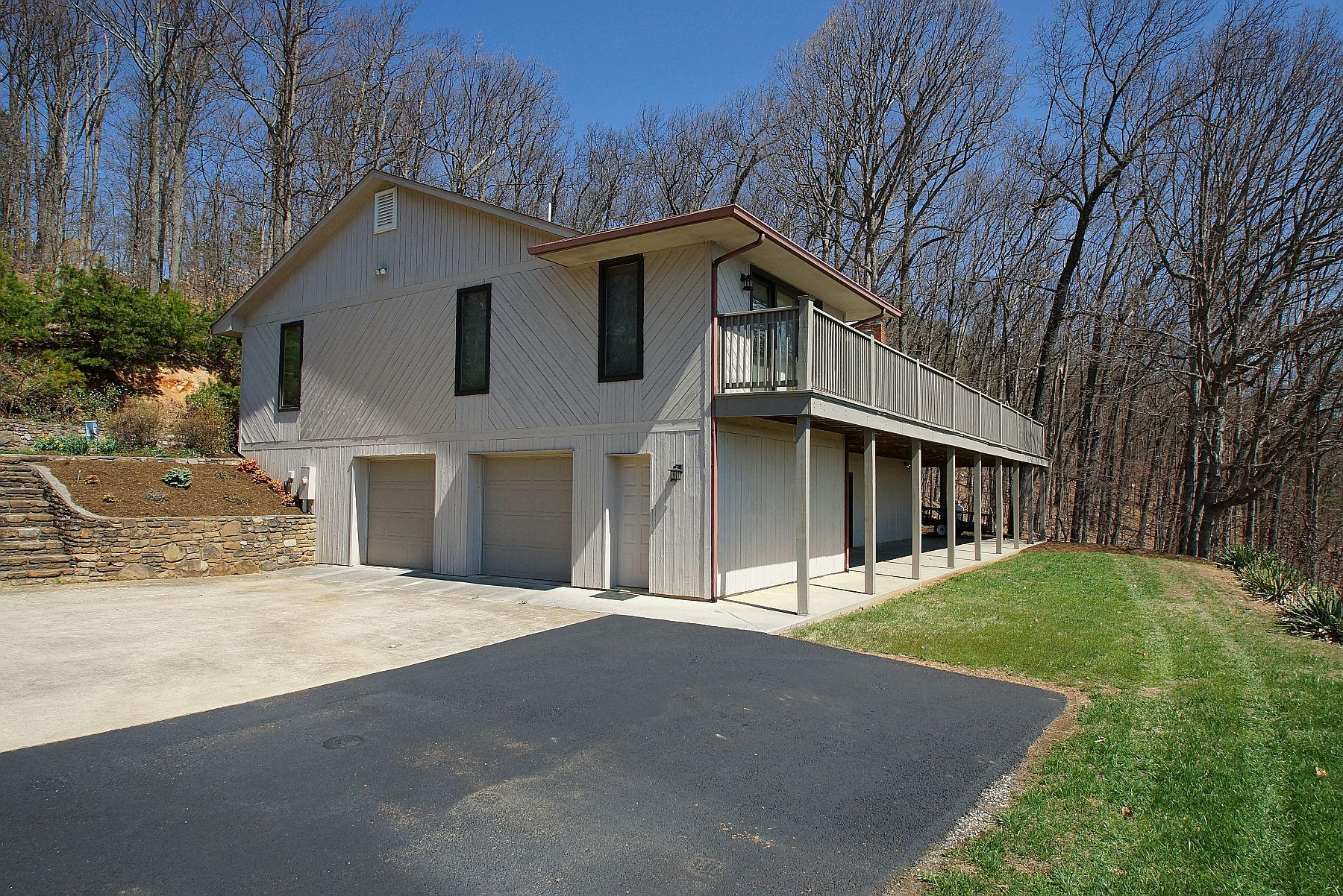 840 Brushy Ridge Road Salem, VA 24153 - Photo 19 of 86 a front view of a house with a yard and garage
